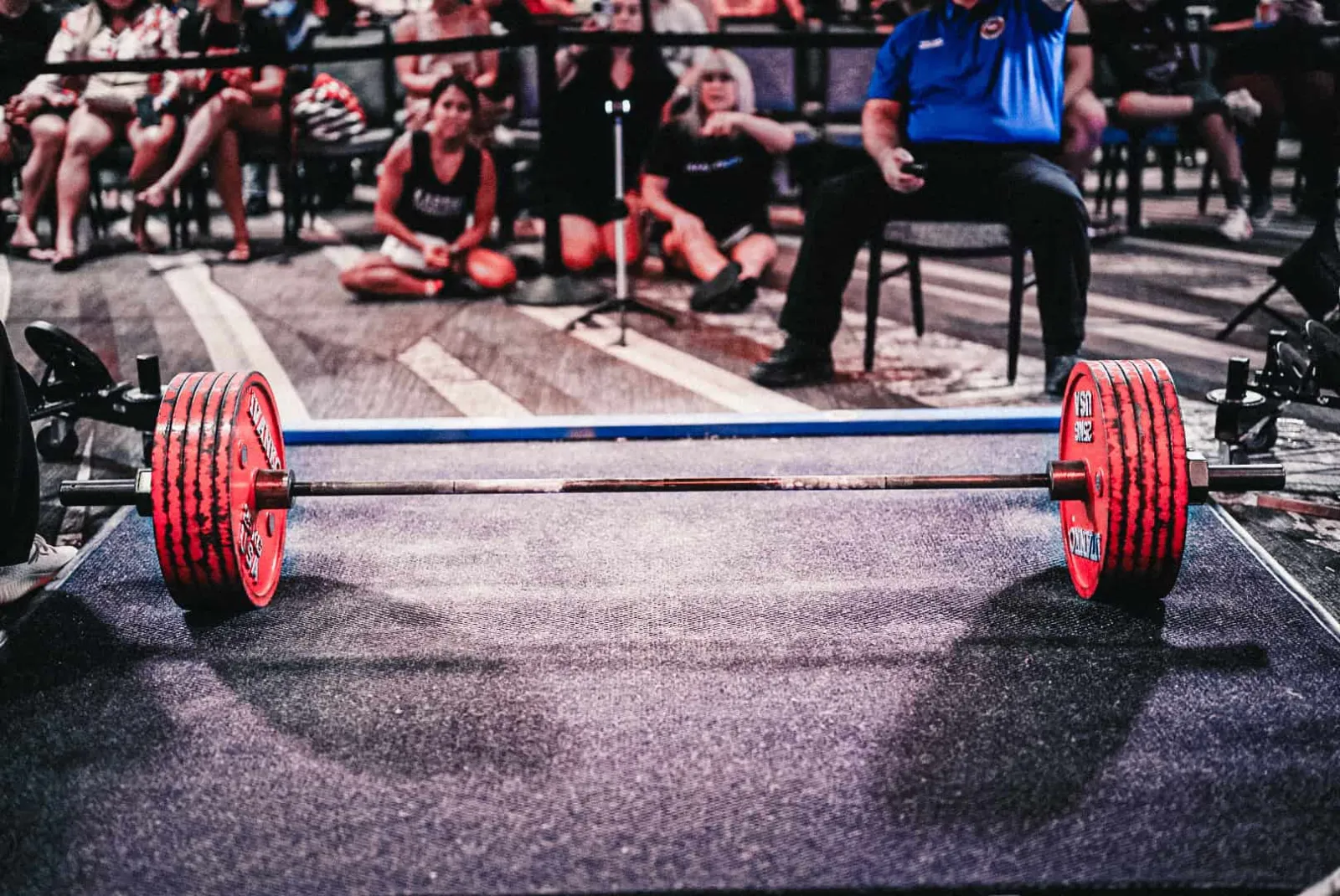 USPA powerlifting competition — loaded barbell on platform