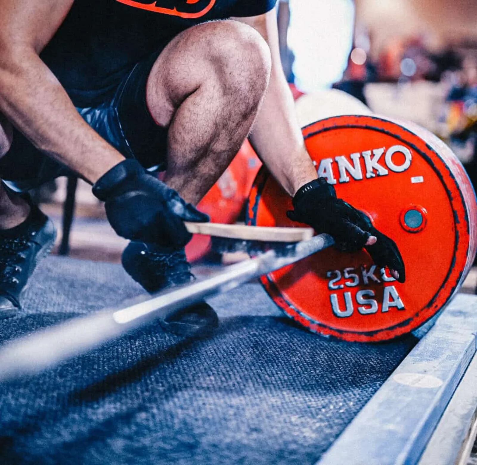 USPA powerlifting competition — loading Ivanko plates