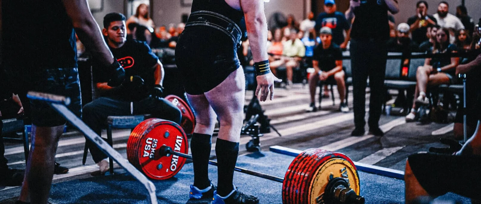 USPA powerlifting competition — lifter on platform after deadlift